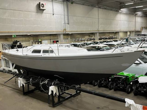 Volvo L90M  Marieholm IF26 classic sailingyacht